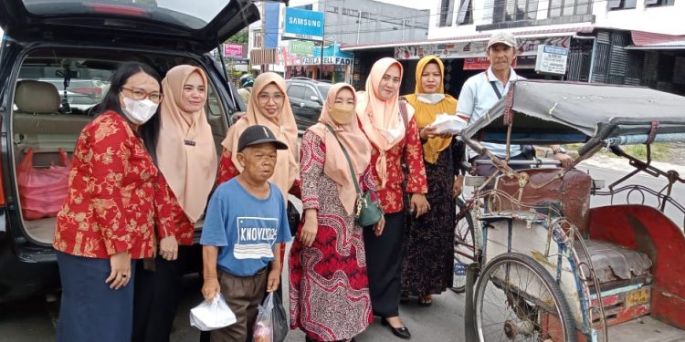 Giat Sosial Dharma Wanita (DW) DPMD ramadhan berbagi